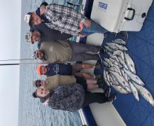 Book a trip with us to take home some fish like this group!